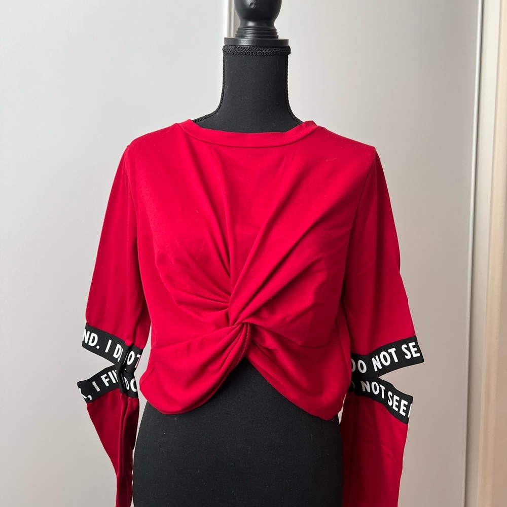 Crop top with elbow cut outs and crisscross front
